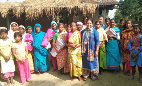 Rose (in blue) at Christmas with village women.